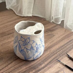 Home trinkbecher mit blumenmotiv